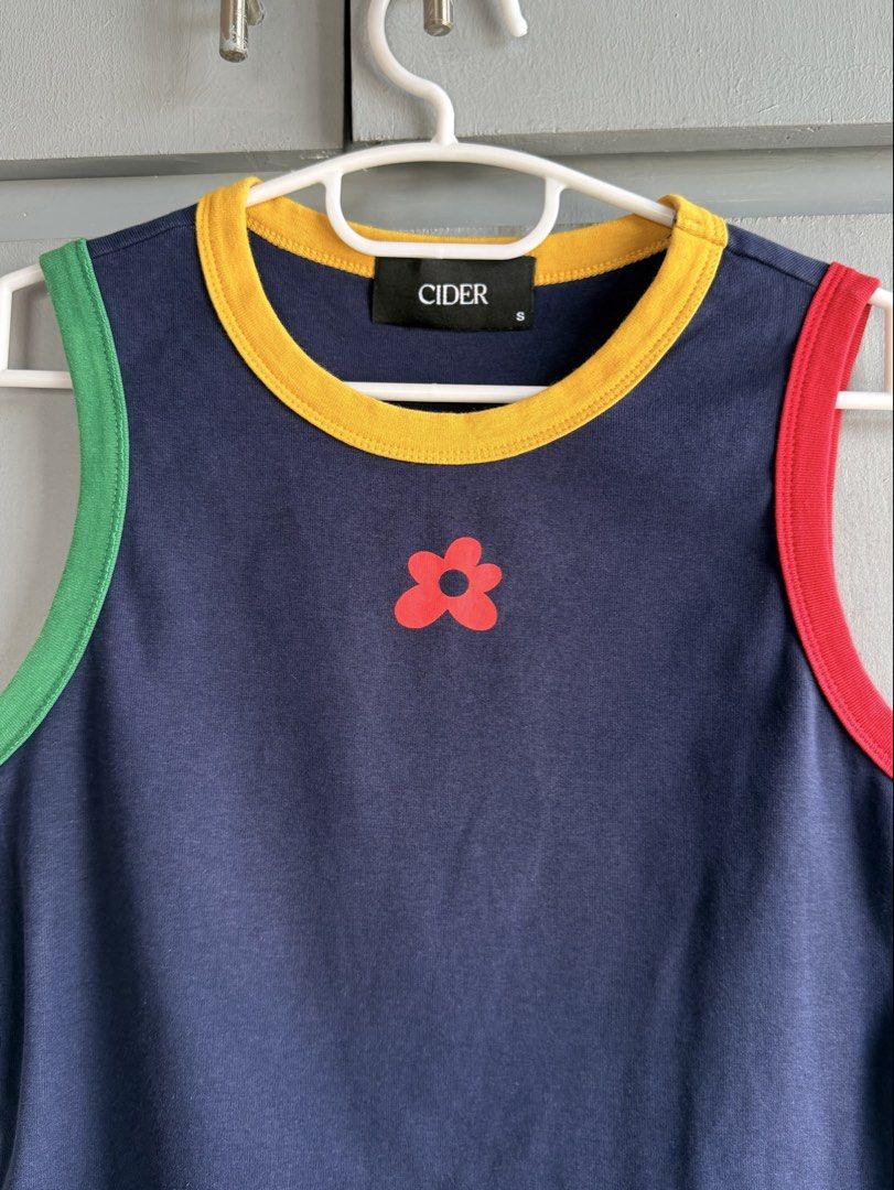 Cider Navy Blue Tank Top (Category: Sleeveless) located in San Juan City. Submitted by itemsfromkam (Listing ID 1470452184, Image 2). Description: • S on tag • cute colorful accents, stretchable, flattering, cropped • actual ww pic at the end.