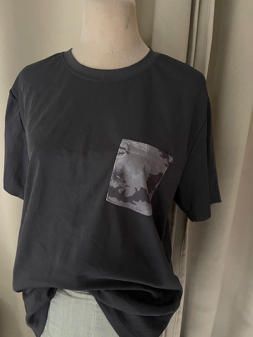 Cinema Grey drifit with Camo Pocket Size LL (Category: Tshirts & Polo Shirts ) located in Cainta. Submitted by zlove111 (Listing ID 1470455303, Image 2). Description: - Brand: Cinema - Size: LL 22" - Color: Dark Grey - Design: Short sleeves, crew neck, and a contrasting grey camouflage chest pocket - Material: Lightweight fabric - Condition: Clean, excellent everyday top.