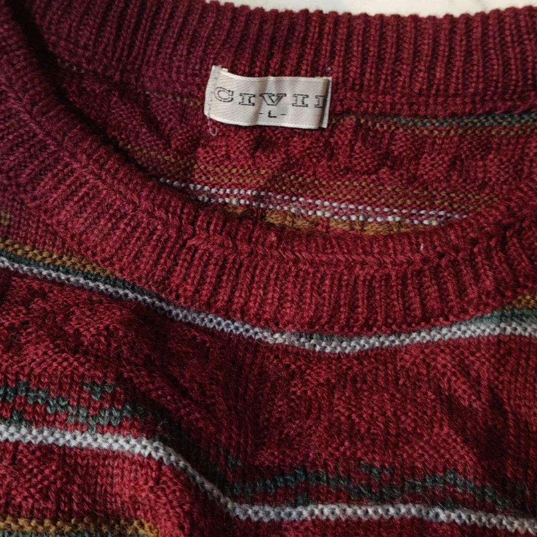CIVII Striped Cable Knit Sweater Maroon Size freesize (Category: Longsleeves) located in Bulacan. Submitted by alyssarys (Listing ID 1470530876, Image 2). Description: - Brand: CIVII - Style: Maroon cable knit with multi-color stripes and subtle geometric patterns - Fit: Sizes L to 2X with plenty of stretch - Details: Crew neck, long sleeves, ribbed cuffs and hem - Material: Lightweight, premium imported knit - Condition: Great casual piece for c