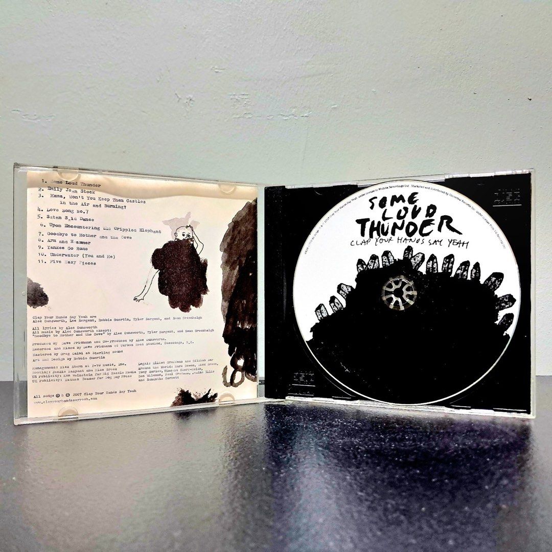 Clap Your Hands Say Yeah Some Loud Thunder CD (Category: CDs & DVDs) located in Caloocan City. Submitted by offthegridfinds (Listing ID 1470508384, Image 2). Description: Clap Your Hands Say Yeah album Some Loud Thunder on CD. Jewel case packaging with original cover art, tracklist insert, and disc. Tracklist includes Some Loud Thunder, Emily Jean Stock, and Five Easy Pieces. Produced by Dave Fridmann. Standard audio CD format..