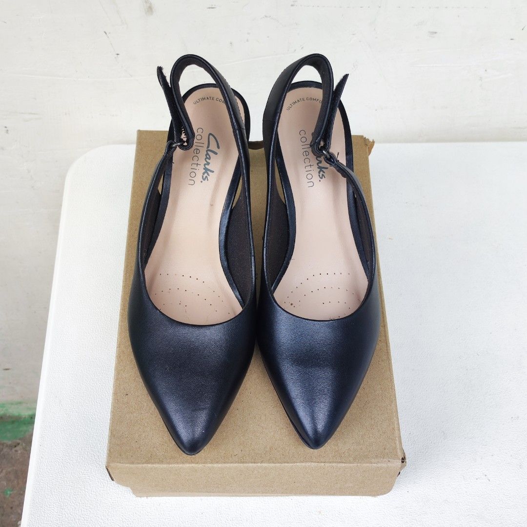 Clarks Women's Slingback Heels (Category: Heels) located in Caloocan City. Submitted by iamqwertyy (Listing ID 1470537711, Image 3). Description: - Brand: Clarks (Model: Illeana Poppy) - Color: Black - Size: US 7 M / UK 4.5 D / EU 37.5 Comfort Features: Ortholite Footbed, Smooth Textile Linings, Durable Rubber Outsole Premium Leather Adjustable Hook and Loop Ankle Strap .