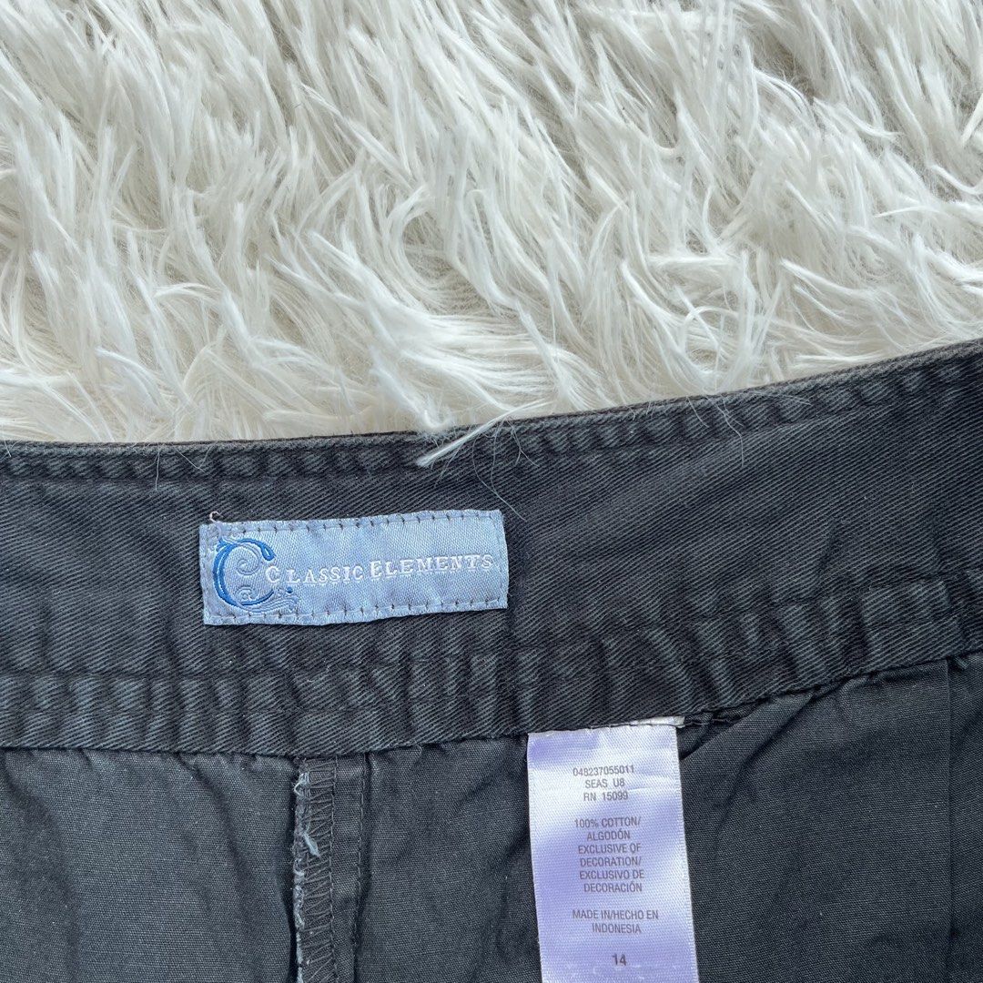 Classic Elements Black Embroidered Dot Skort Size 14 (Category: Skirts) located in Cuyapo. Submitted by Ashtyn.Pre.Loved (Listing ID 1470494176, Image 2). Description: - Brand/Style: Classic Elements black skort - Design: Colorful embroidered polka dots all over with a front skirt panel - Comfort: Built-in shorts underneath - Size: Tagged Size 14 - Material: 100% cotton - Origin: Made in Indonesia - Condition: Fun, playful, and ready to wear!.