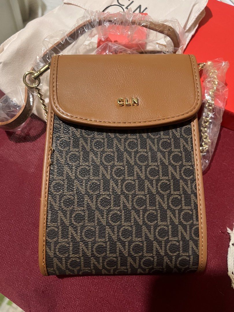 CLN Monogram Print Sling Bag Brown Tan (Category: Cross-body Bags) located in Imus. Submitted by taichii_ (Listing ID 1470387613, Image 3). Description: - Brand: CLN - Color: Brown and tan with all-over monogram print - Style: Compact crossbody sling bag / phone pouch - Closure & Hardware: Flap closure with magnetic snap button and gold metallic branding - Strap: Adjustable shoulder strap (still wrapped in plastic) - Inclusions: Original dust bag