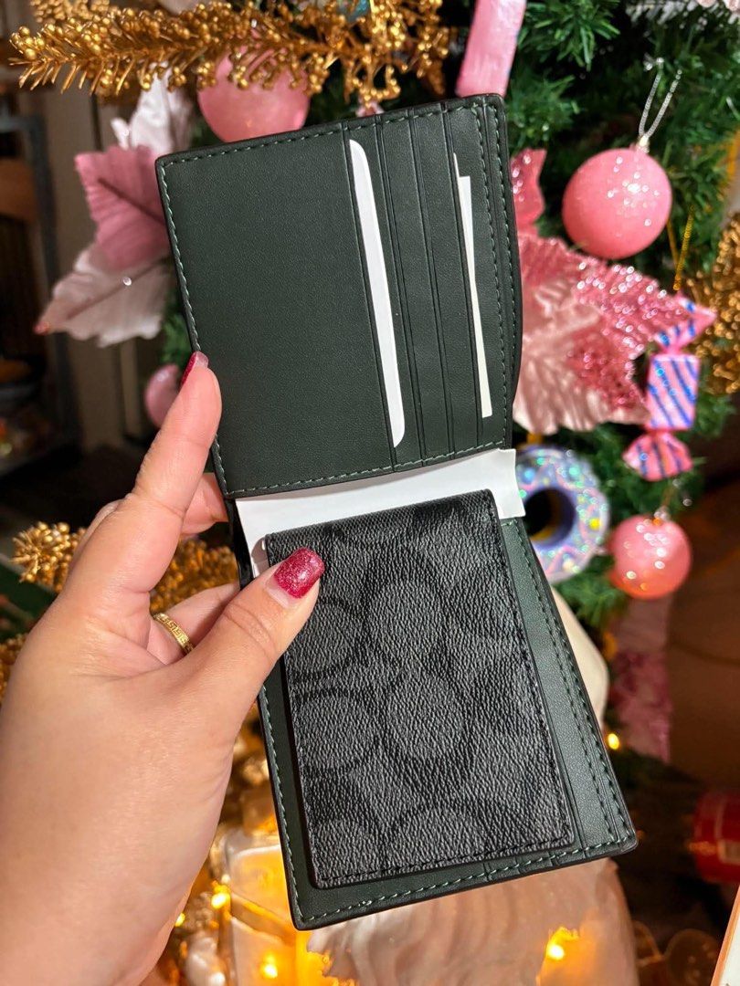 Coach Bifold Wallet with Stripe design (Category: Wallets & Card Holders) located in Rizal. Submitted by mclluxurycollection (Listing ID 1470545263, Image 2). Description: Brand new Guaranteed original 💯.