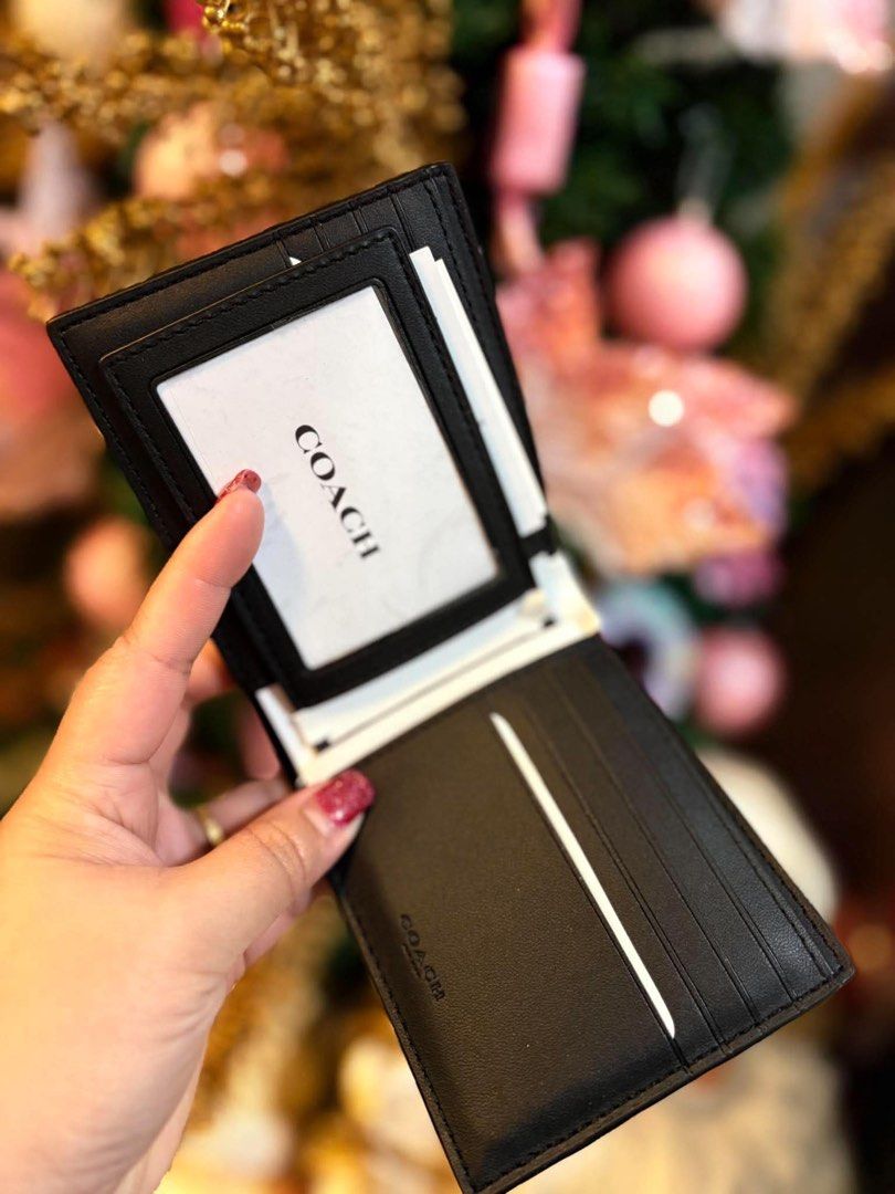 Coach Bifold Wallet with Stripe design (Category: Wallets & Card Holders) located in Rizal. Submitted by mclluxurycollection (Listing ID 1470545263, Image 3). Description: Brand new Guaranteed original 💯.
