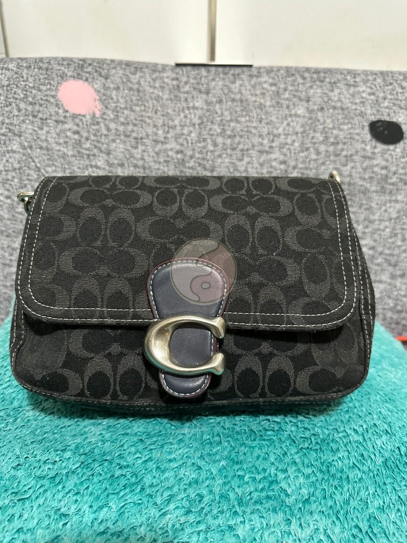 Coach Black Canvas Soft Tabby Shoulder (Category: Luxury Bags & Wallets) located in Mandaluyong City. Submitted by adoresellie (Listing ID 1470428570, Image 3). Description: 2022 Coach Black Canvas Soft Tabby Shoulder CG094 Made in Vietnam Preloved bag with FLAWS (check photos): - No long sling - Not for resellers - Bawal sa maselan RFS: Decluttering Disclaimer: Not affiliated with or endorsed by any brand. I am simply selling my personal pre-own