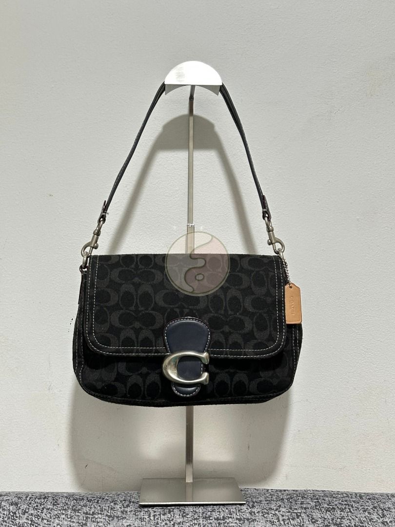 Coach Black Canvas Soft Tabby Shoulder (Category: Luxury Bags & Wallets) located in Mandaluyong City. Submitted by adoresellie (Listing ID 1470428570, Image 1). Description: 2022 Coach Black Canvas Soft Tabby Shoulder CG094 Made in Vietnam Preloved bag with FLAWS (check photos): - No long sling - Not for resellers - Bawal sa maselan RFS: Decluttering Disclaimer: Not affiliated with or endorsed by any brand. I am simply selling my personal pre-own