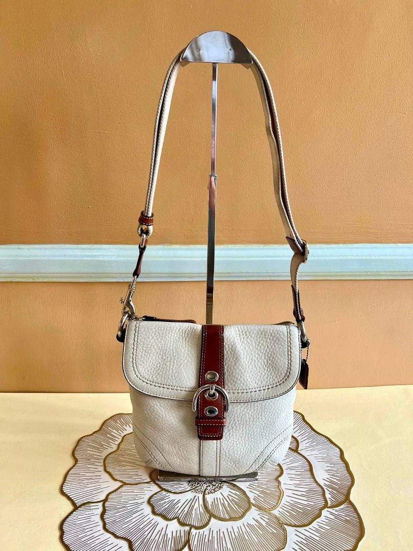 Coach Soho Flap Crossbody (Category: Cross-body Bags) located in Quezon City. Submitted by bellafashion08 (Listing ID 1470362444, Image 1). Description: - Authentic Coach crossbody bag Dimension: - Height = 7 in. - Length = 7 in. * From U.S * Nice in actual .
