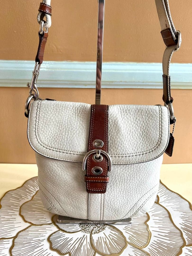 Coach Soho Flap Crossbody (Category: Cross-body Bags) located in Quezon City. Submitted by bellafashion08 (Listing ID 1470362444, Image 3). Description: - Authentic Coach crossbody bag Dimension: - Height = 7 in. - Length = 7 in. * From U.S * Nice in actual .