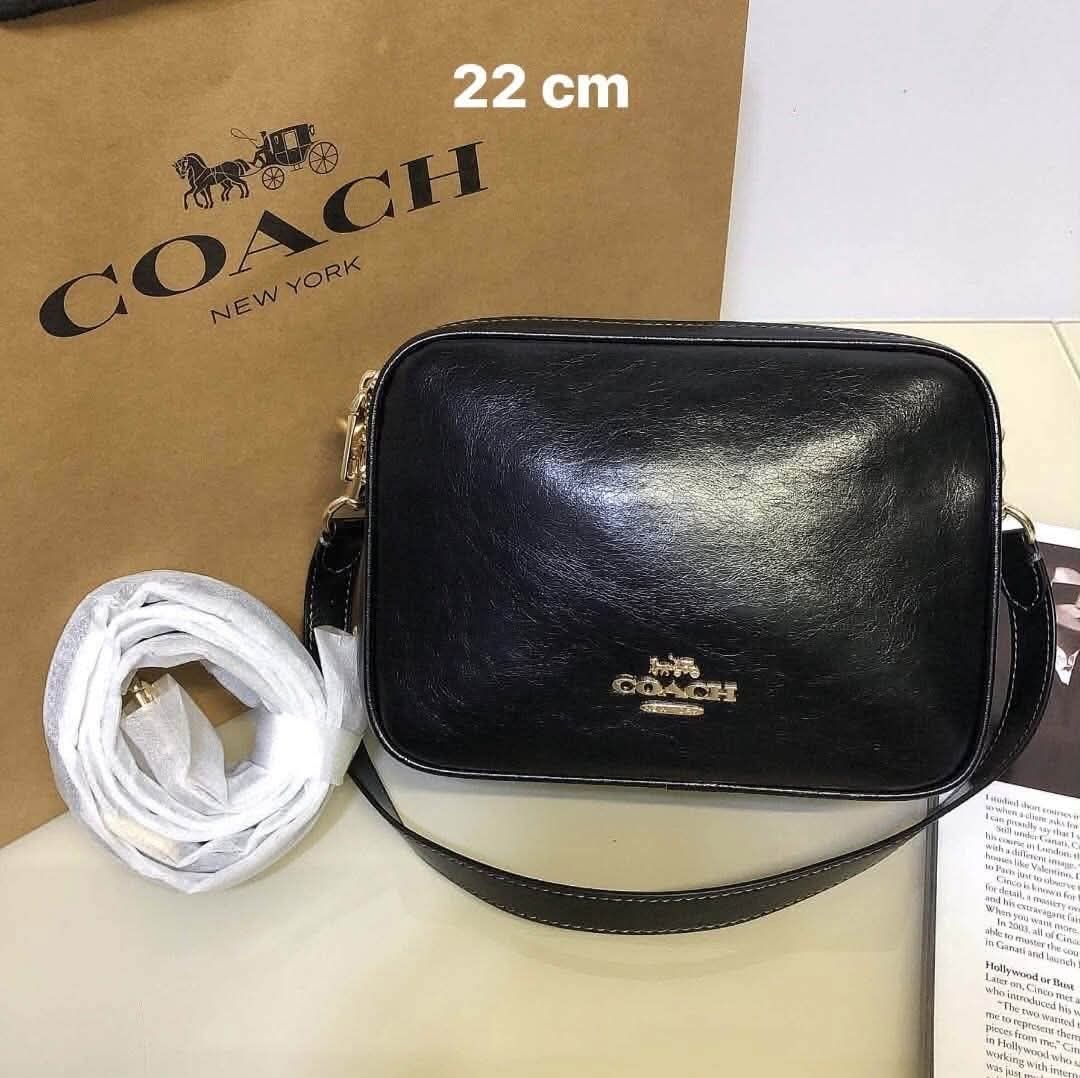 Coach Camera Bag Crossbody 22cm Multiple Colors Available (Category: Cross-body Bags) located in Morong. Submitted by katiesluxurybags (Listing ID 1470424453, Image 3). Description: - Brand: Coach - Size: 22 cm, great everyday size - Closure & Hardware: Zip-around closure with elegant gold-tone hardware and front metal logo - Strap: Includes a detachable and adjustable shoulder strap - Interior: Clean lining with a convenient slip pocket - Availa