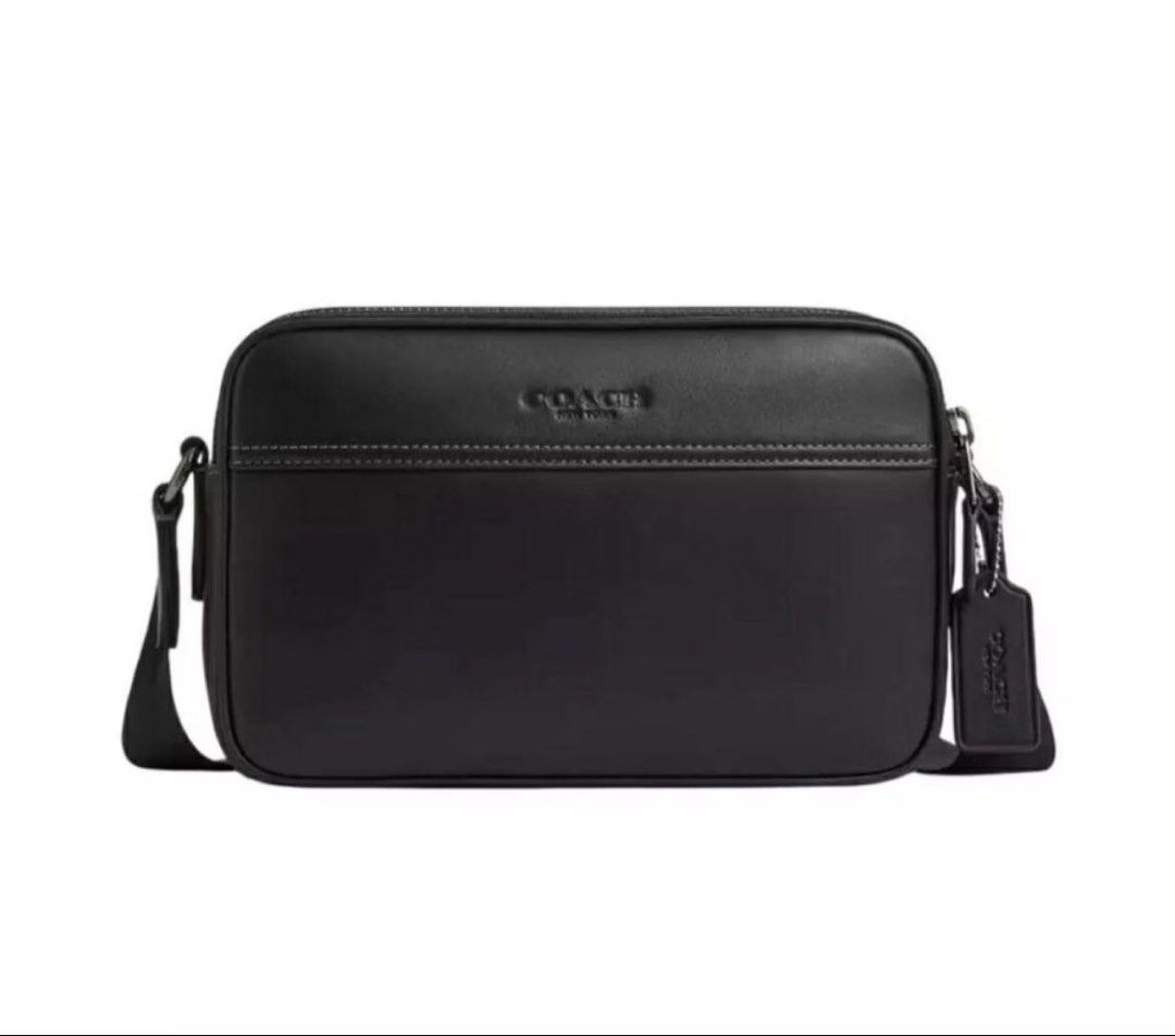 Coach Graham Crossbody Bag Black (Category: Cross-body Bags) located in Cabanatuan. Submitted by paul04_moon (Listing ID 1470397813, Image 1). Description: - Authentic Coach Graham crossbody bag in classic black leather - Sleek design featuring dual zipped compartments - Comfortable adjustable strap for easy wear - Subtle debossed Coach logo on the front - Includes original tag with retail price - Perfect everyday carryall for your daily essentia