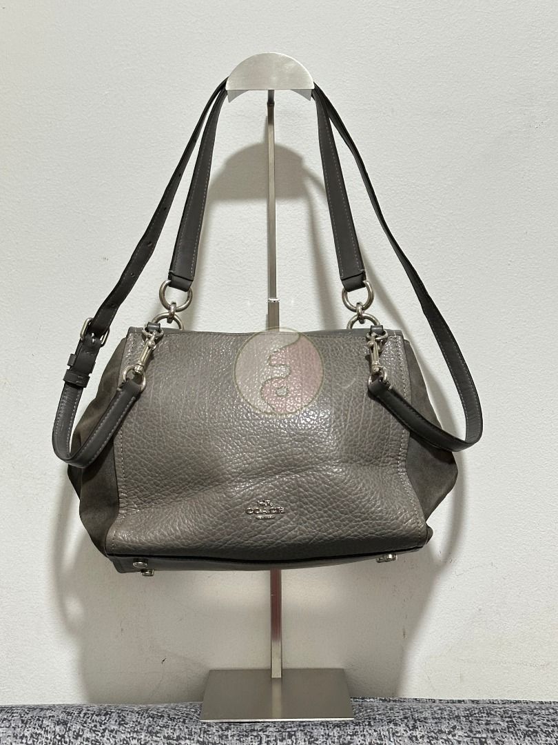 Coach Gray Leather Faye Carryall (Category: Luxury Bags & Wallets) located in Mandaluyong City. Submitted by adoresellie (Listing ID 1470430611, Image 2). Description: 2018 Coach Gray Leather Faye Carryall F22340 Made in Vietnam Preloved bag with FLAWS (check photos): - Missing rubber lining in sling (minor) - Minor rubs in body - Rubs in creed - Metal scratches - Not for resellers - Bawal sa maselan RFS: Decluttering Disclaimer: Not affiliated w