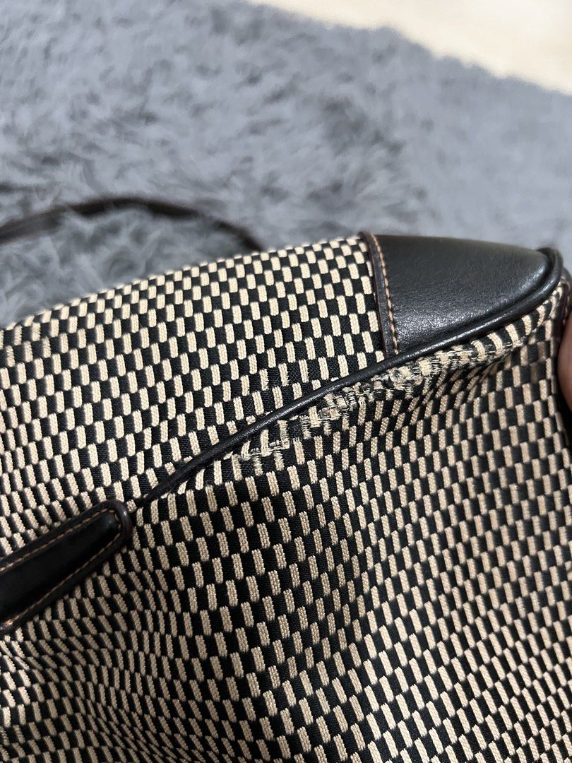 Coach Mini Kelsey Legacy Collection Jacquar (Category: Luxury Bags & Wallets) located in San Pedro. Submitted by _eyamarie (Listing ID 1470469718, Image 3). Description: Issue: Restitch sa likod, rubs and crack sa rubber lining see last photos na lang po.