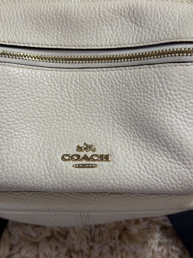 COACH Mini Leather Backpack – Cream (Category: Backpacks) located in Baliuag. Submitted by defnotmikaelaaaa (Listing ID 1470405578, Image 2). Description: Details: Model: Coach Court Backpack / Mini Court Backpack in Pebble Leather Size: Mini / Small Approx. Dimensions: 8.5” W × 9.5” H × 4” D (22 × 24 × 10 cm) * Authentic Coach mini backpack * Soft pebbled leather exterior * Gold Coach logo on front * Spacious zippered main compartment * Front zi