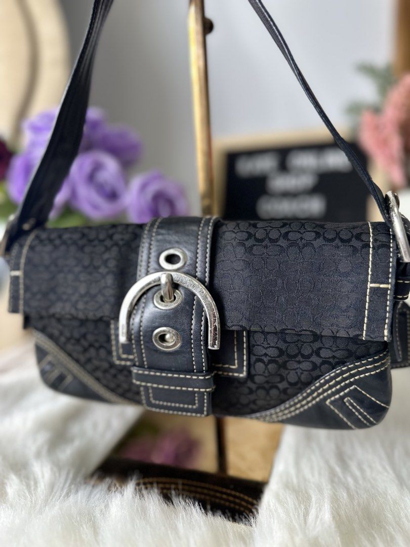 Coach Mini Soho Signature Baguette (Category: Shoulder Bags) located in Sablan. Submitted by kayescorner (Listing ID 1470354815, Image 3). Description: Coach Mini Soho Signature Baguette Shoulder Bag GOOD PRE-OWNED CONDITION / RANK AB 📌Signs of wear minor corner rubbing, visible scratches on hardware, soft leather handle w/ crack lining 📌Overall, the bag remains presentable and suitable for everyday use. 💰8,350.00 BENGUET AREA 📍 Shipping: J&T