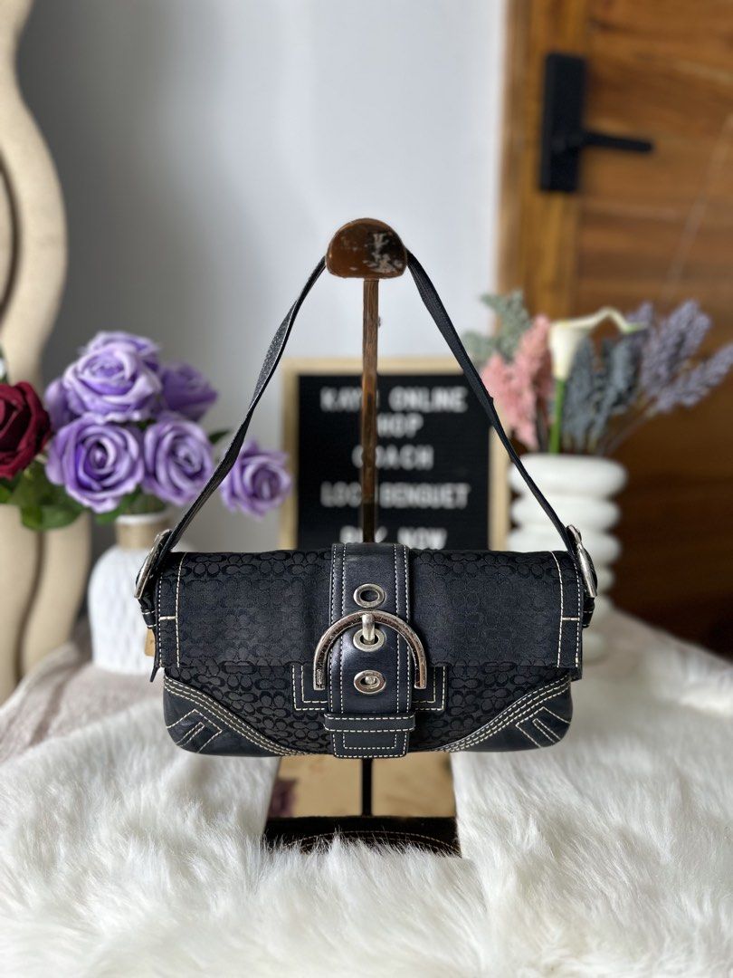 Coach Mini Soho Signature Baguette (Category: Shoulder Bags) located in Sablan. Submitted by kayescorner (Listing ID 1470354815, Image 1). Description: Coach Mini Soho Signature Baguette Shoulder Bag GOOD PRE-OWNED CONDITION / RANK AB 📌Signs of wear minor corner rubbing, visible scratches on hardware, soft leather handle w/ crack lining 📌Overall, the bag remains presentable and suitable for everyday use. 💰8,350.00 BENGUET AREA 📍 Shipping: J&T