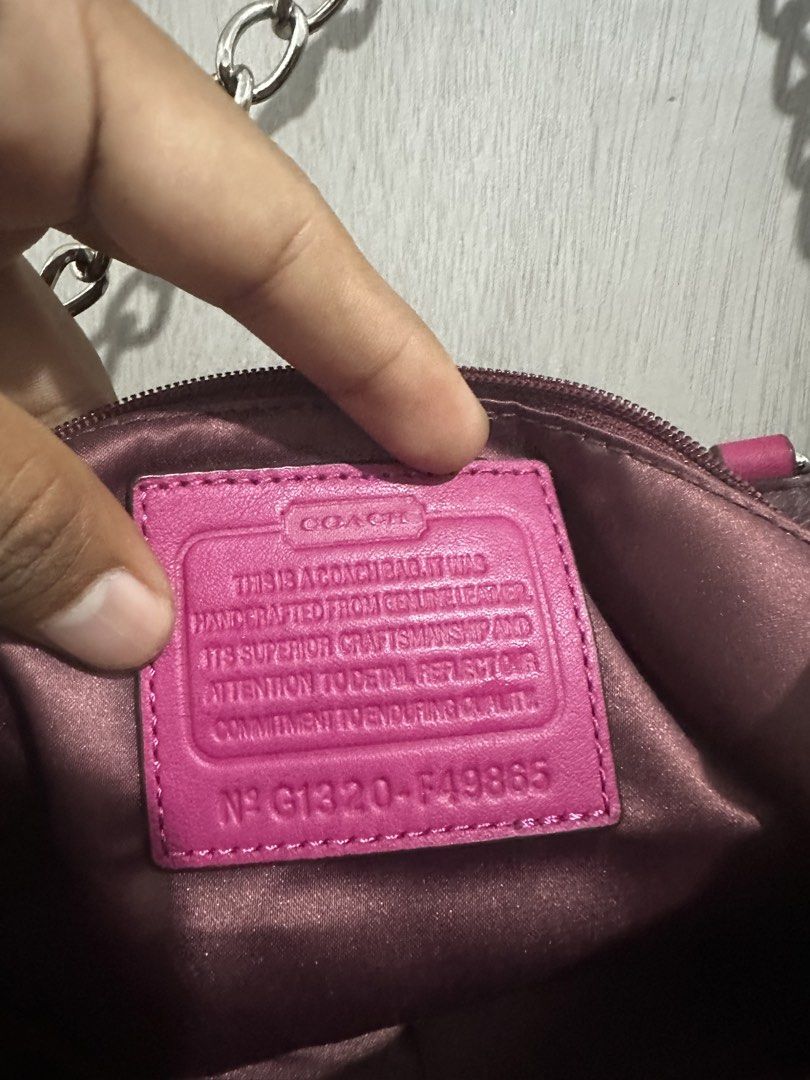 Coach Multi-Color Leather Handbag F49865 (Category: Luxury Bags & Wallets) located in Digos. Submitted by reywearfinds (Listing ID 1470500262, Image 2). Description: - Authentic Coach multi-color handbag in pink, dark burgundy, and grey suede - Features a chic quilted front pocket with secure turn-lock closure - Elegant silver-tone hardware with both double top handles and a chain shoulder strap - Secure top zipper closure to keep your essentials