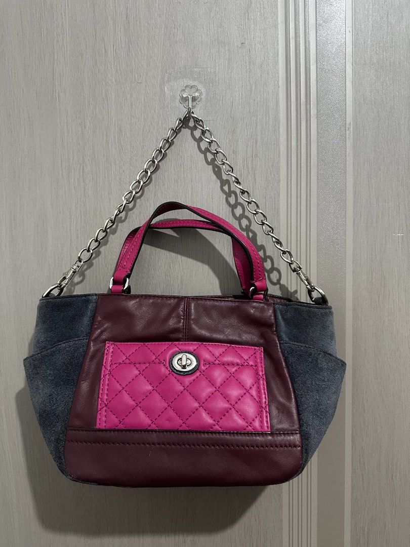 Coach Multi-Color Leather Handbag F49865 (Category: Luxury Bags & Wallets) located in Digos. Submitted by reywearfinds (Listing ID 1470500262, Image 1). Description: - Authentic Coach multi-color handbag in pink, dark burgundy, and grey suede - Features a chic quilted front pocket with secure turn-lock closure - Elegant silver-tone hardware with both double top handles and a chain shoulder strap - Secure top zipper closure to keep your essentials