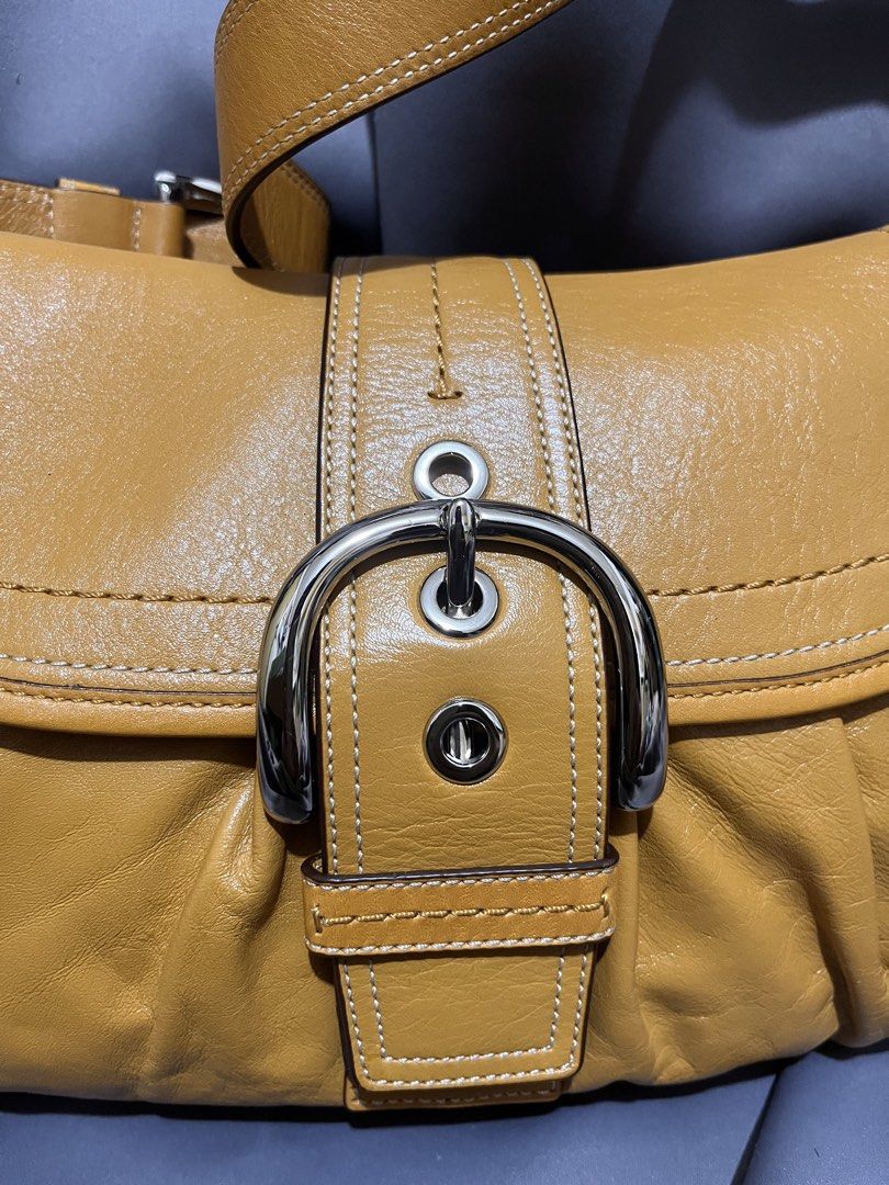 Coach Soho mustard color med size (Category: Luxury Bags & Wallets) located in Davao. Submitted by harryybane90592 (Listing ID 1470529976, Image 3). Description: .
