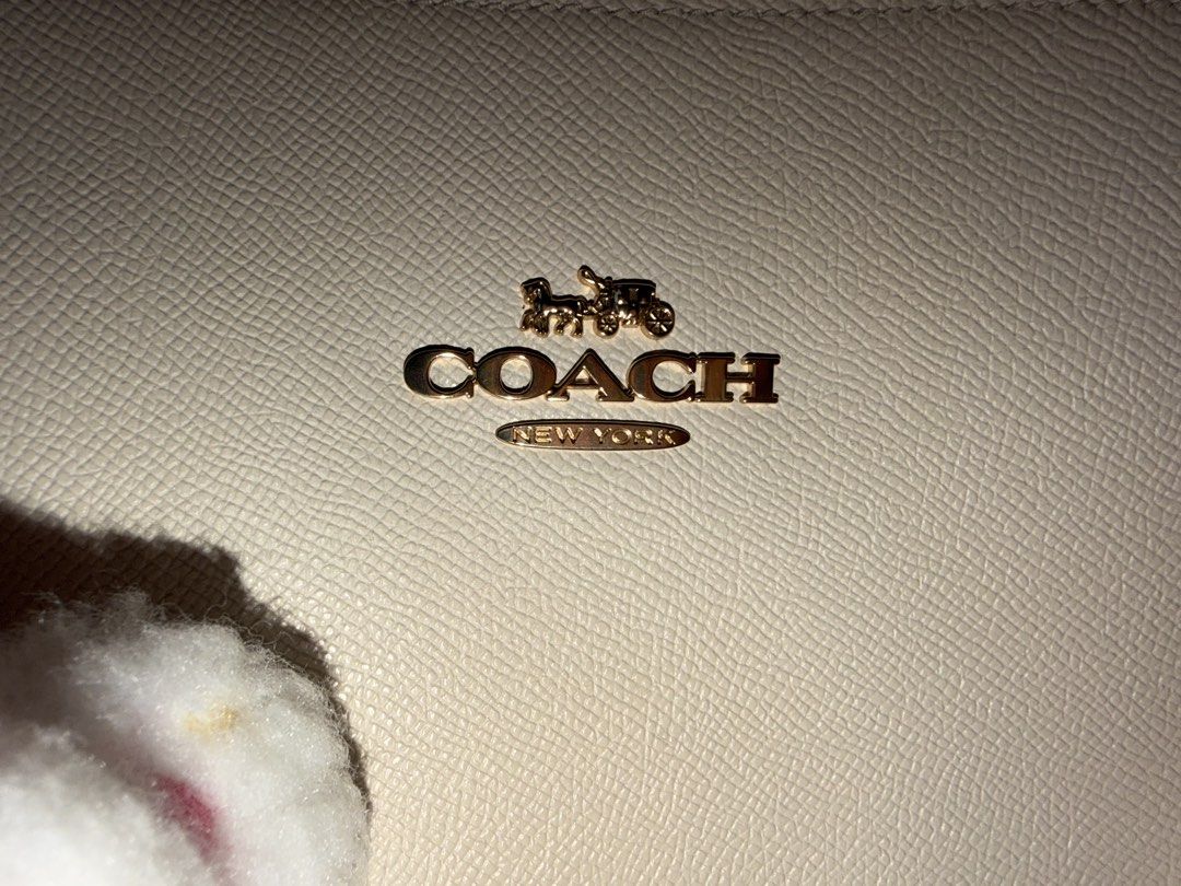 Coach Tote bag (Category: Tote Bags) located in Davao. Submitted by iceangel09 (Listing ID 1470389688, Image 2). Description: Crossgrain leather Inside cell phone and multifunction pockets Zip-top closure, fabric lining Handles with 10” drop 11 1/2” (L) x 9 1/2” (H) x 4 1/2” (W) Style No. 4454 Color: Chalk.