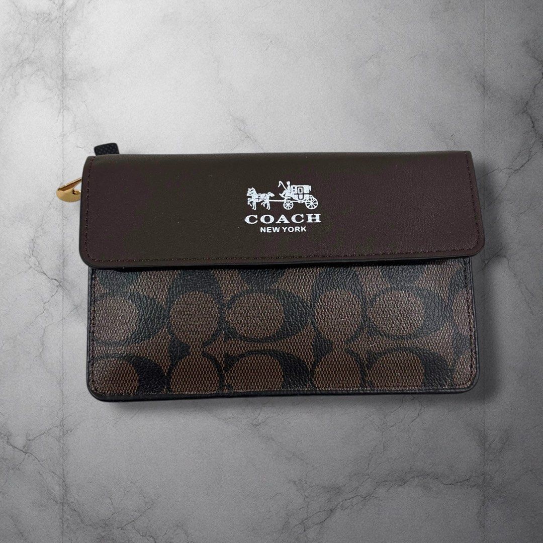 Coach Wrislet Wallet Pouch (Category: Wallets & Card holders) located in Cavite. Submitted by itsayaaa (Listing ID 1470539721, Image 1). Description: No Issue Excellent Condition .