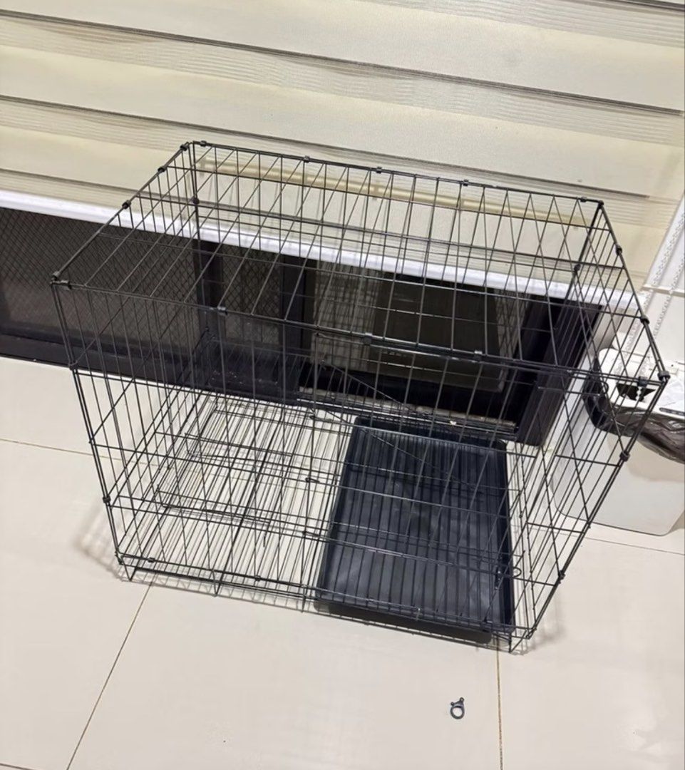 Collapsible Pet Cage Carrier (Large) (Category: Homes & Other Pet Accessories) located in Manila. Submitted by ms.aaaaa (Listing ID 1470359869, Image 1). Description: -size: large -dimensions: 70x50x60cm -just stocked up and never been used at all -already folded location: Parañaque .