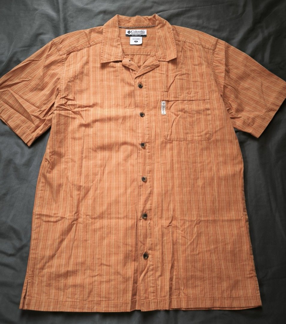 Columbia short sleeve polo (Category: Tshirts & Polo Shirts ) located in Manila. Submitted by wearforce (Listing ID 1470491041, Image 2). Description: Columbia short sleeve polo color: bright orange fit: M-L color rate 10/10 in good condition 399 + sf.