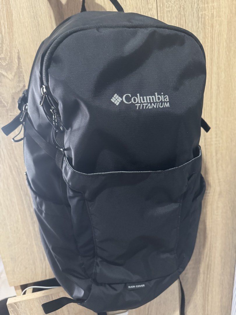 Columbia Titanium Black Backpack with Rain Cover (Category: Backpacks) located in Mandaluyong City. Submitted by raykin (Listing ID 1470392395, Image 3). Description: - Brand: Columbia Titanium - Color: Versatile Black - Comfort: Padded mesh shoulder straps and breathable back panel - Storage: Front slip pocket and multiple secure zipper compartments - Extra Feature: Built-in rain cover located at the bottom - Best For: Hiking, school, and daily 
