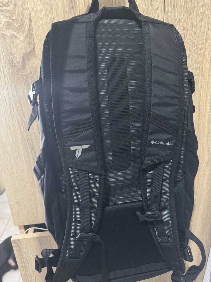 Columbia Titanium Black Backpack with Rain Cover (Category: Backpacks) located in Mandaluyong City. Submitted by raykin (Listing ID 1470392395, Image 2). Description: - Brand: Columbia Titanium - Color: Versatile Black - Comfort: Padded mesh shoulder straps and breathable back panel - Storage: Front slip pocket and multiple secure zipper compartments - Extra Feature: Built-in rain cover located at the bottom - Best For: Hiking, school, and daily 