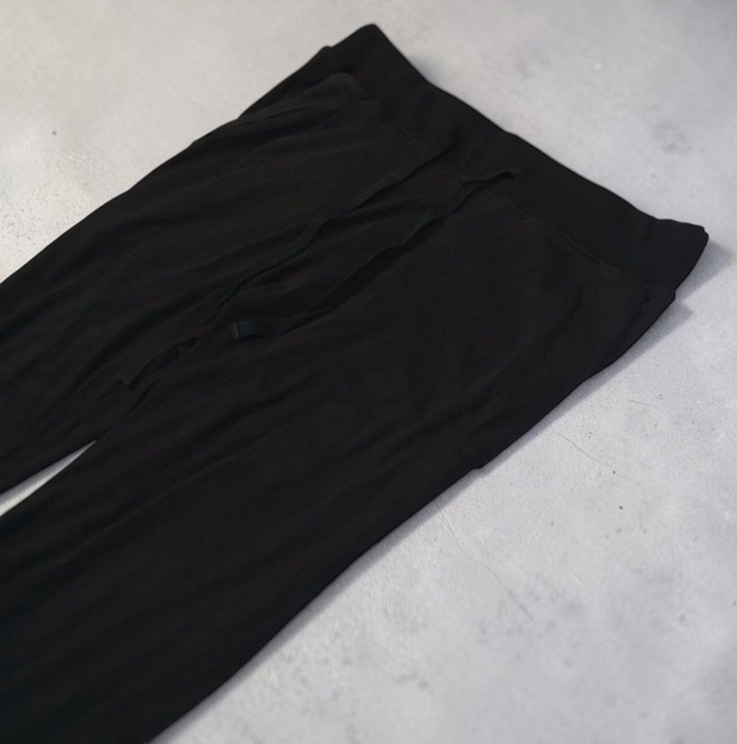 Comme Des Garcons - Black - Jogger Pants (Category: Joggers) located in Manila. Submitted by grmnts_frmthe_slmz (Listing ID 1470401785, Image 3). Description: Solid black casual pants. Elastic waistband with a matching drawstring closure. Two side pockets included for convenience. Straight leg cut. Soft, comfortable fabric material. Great everyday loungewear piece. Easy to mix and match with various tops and hoodies. Comme Des Garcons - Black - J