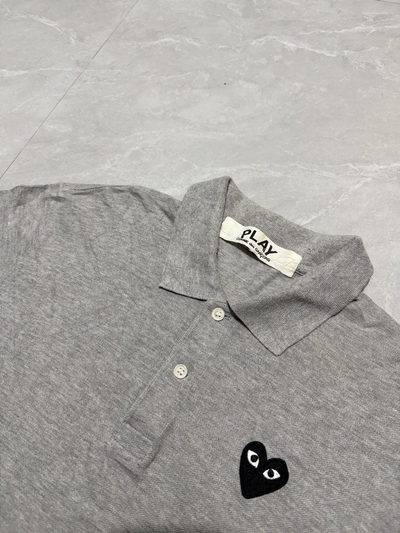 COMME des GARÇONS PLAY Polo (Category: Tshirts & Polo Shirts ) located in Calumpit. Submitted by Essentiality (Listing ID 1470506936, Image 3). Description: COMME des GARÇONS PLAY Polo 18x28 L on tag ₱2,000.