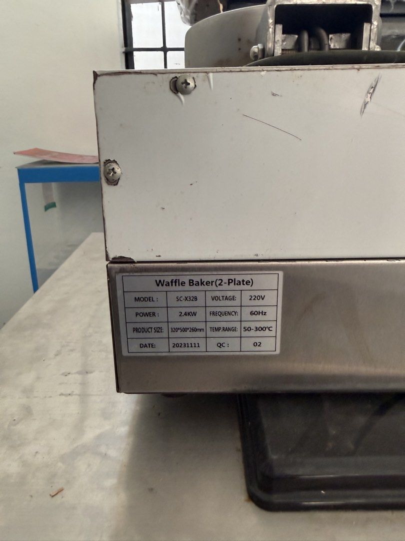 Commercial Waffle Maker 2-Plate SC-X32B (Category: Cookware & Accessories) located in Imus. Submitted by neirasalonga_ (Listing ID 1470441615, Image 3). Description: - Model: SC-X32B Commercial Double Plate Waffle Baker - Power: 2.4KW, 220V (Standard plug attached) - Temperature Range: Adjustable from 50°C to 300°C - Build: Heavy-duty stainless steel with spring-wrapped handles - Condition: Needs a quick wipe down from storage - Ideal Use: Perfec