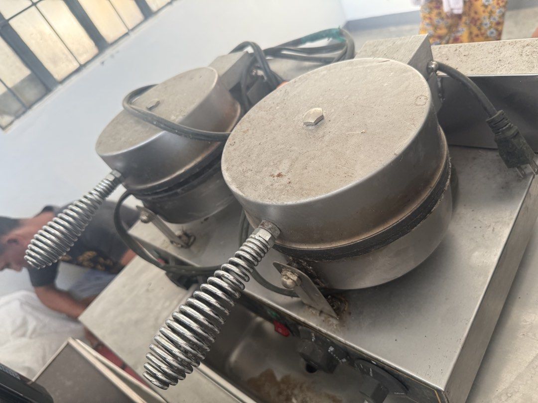 Commercial Waffle Maker 2-Plate SC-X32B (Category: Cookware & Accessories) located in Imus. Submitted by neirasalonga_ (Listing ID 1470441615, Image 2). Description: - Model: SC-X32B Commercial Double Plate Waffle Baker - Power: 2.4KW, 220V (Standard plug attached) - Temperature Range: Adjustable from 50°C to 300°C - Build: Heavy-duty stainless steel with spring-wrapped handles - Condition: Needs a quick wipe down from storage - Ideal Use: Perfec