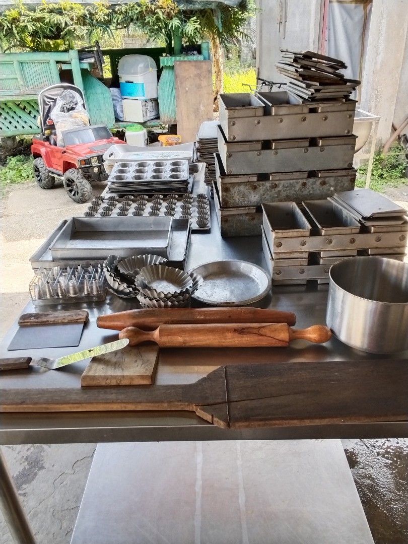 Complete set bakery equipment (Category: Bakeware) located in Lubao. Submitted by sofiangel (Listing ID 1470491556, Image 1). Description: Oven 12 tray capacity, bread slicer, flour muxer, bangka, 2 break rack 1 stainless table, trays, rolli pin etc..