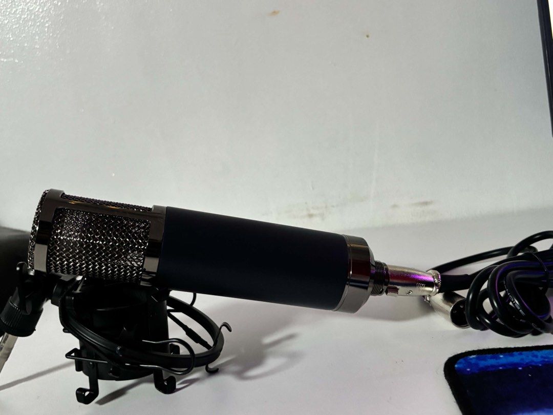 Condenser Microphone with Shock Mount and XLR Cable (Category: Microphones) located in Caloocan City. Submitted by imlei (Listing ID 1470533294, Image 1). Description: - Sleek matte black studio condenser mic with a durable metal mesh grille - Comes complete with a black spider shock mount to reduce vibrations and handling noise - Includes an XLR cable already plugged into the base - Ideal for live streaming, podcasting, and home vocal recording 