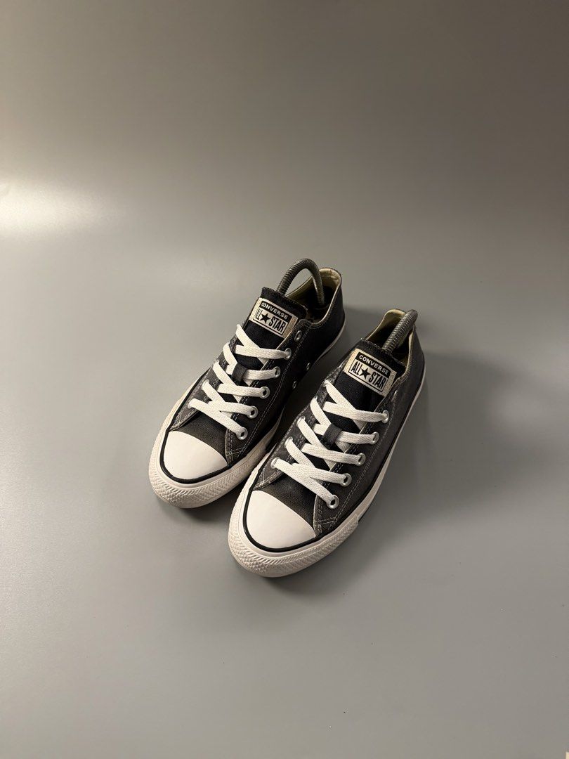 Converse All Star Low Top Charcoal Grey Sneakers (Category: Sneakers) located in Quezon City. Submitted by markieexp (Listing ID 1470460802, Image 2). Description: - Brand: Converse All Star - Style: Low top sneakers - Color: Charcoal grey with white and black details - Size: Men's 7 - Condition: Minor wear visible on soles, overall great shape - Classic canvas upper and durable rubber outsole - Ready to ship / Meet-ups available.