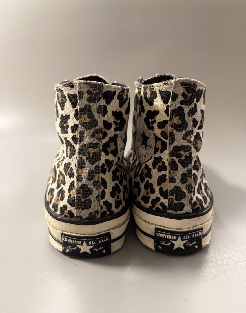 Converse Chuck 70 Hi Leopard Print Sneakers (Category: Sneakers) located in Caloocan City. Submitted by maempenafi21452 (Listing ID 1470461737, Image 3). Description: - Model: Converse Chuck 70 High Top - Design: Bold leopard print canvas upper - Details: Off-white rubber midsoles, black foxing stripes, and classic All Star heel license plates - Condition: Great pre-loved condition, brown rubber outsoles with minimal wear - Size: Men's US 8 / Wom