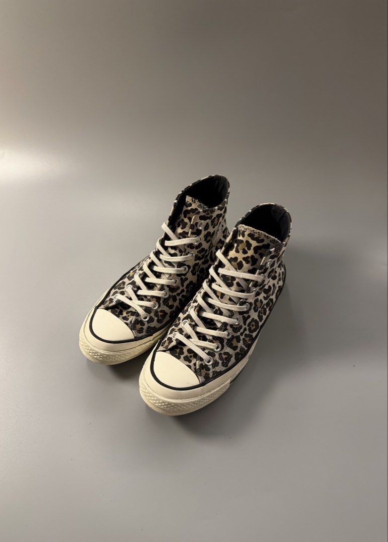 Converse Chuck 70 High Top Leopard Print Sneakers (Category: Sneakers) located in Quezon City. Submitted by markieexp (Listing ID 1470460522, Image 2). Description: - Brand/Model: Converse Chuck 70 High Top - Style: Classic leopard print canvas - Size: Men's 8 / Women's 10 / UK 8 / EUR 41.5 / CM 26.5 - Details: White rubber midsoles, black pinstripe detailing, brown waffle outsoles, white laces, metal eyelets - Origin: Made in Vietnam - Condition
