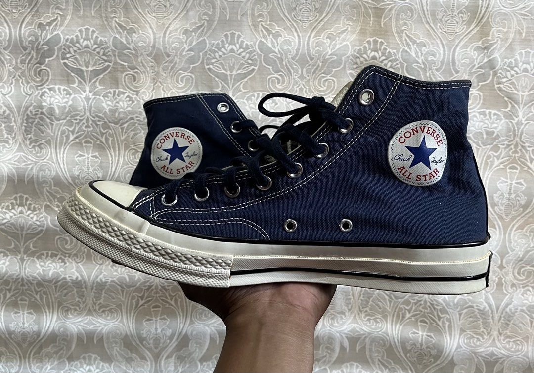 Converse Chuck 70 High Top Navy Blue (Category: Shoe inserts & accessories) located in General Santos City (Dadiangas). Submitted by thiftnibadi3 (Listing ID 1470395132, Image 1). Description: - Brand: Converse Chuck 70 High Top - Color: Navy blue with dark blue laces - Material: Premium canvas upper with contrast stitching - Design Details: Classic rubber toe cap, vulcanized sole, black foxing stripe on midsole - Branding: Iconic black and white