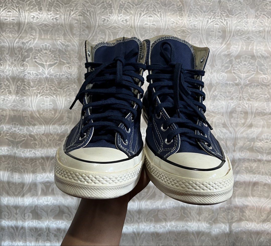 Converse Chuck 70 High Top Navy Blue (Category: Shoe inserts & accessories) located in General Santos City (Dadiangas). Submitted by thiftnibadi3 (Listing ID 1470395132, Image 2). Description: - Brand: Converse Chuck 70 High Top - Color: Navy blue with dark blue laces - Material: Premium canvas upper with contrast stitching - Design Details: Classic rubber toe cap, vulcanized sole, black foxing stripe on midsole - Branding: Iconic black and white