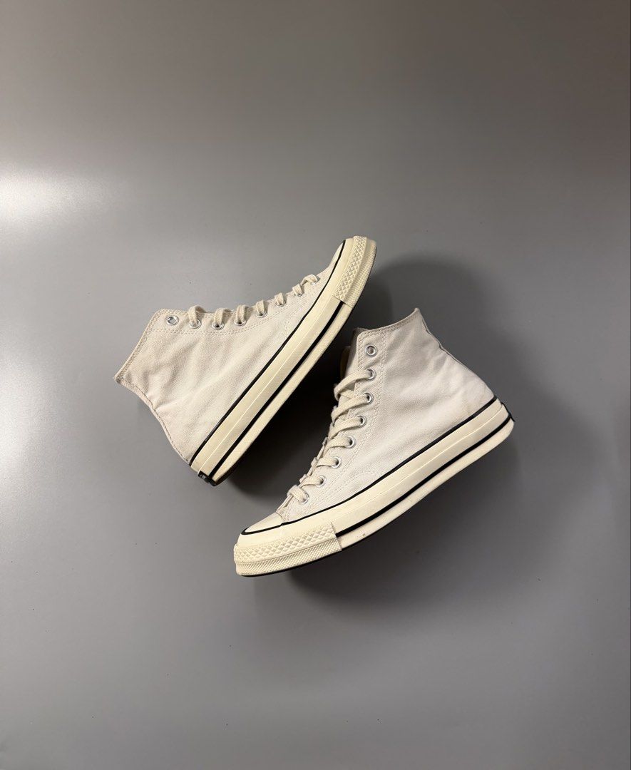 Converse Chuck 70 High Top Parchment Canvas Sneakers (Category: Sneakers) located in Quezon City. Submitted by markieexp (Listing ID 1470460026, Image 1). Description: - Brand: Converse Chuck 70 High Top - Color: Parchment Canvas with black foxing tape and vintage glossy rubber sidewalls - Size: Men 8.5, Women 10.5, UK 8.5, EUR 42, 270mm - Features: Classic woven tongue label, brown rubber outsole with waffle tread, and clean white laces - Condit