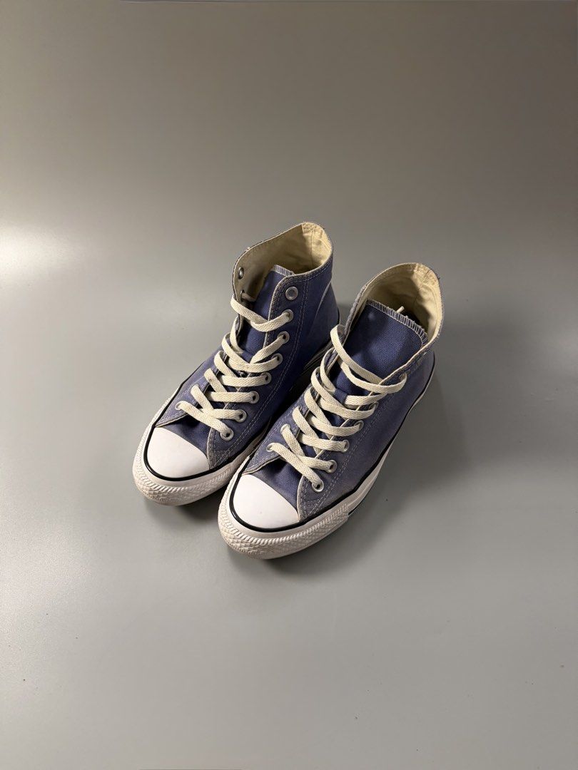 Converse Chuck Taylor All Star High Top Blue (Category: Sneakers) located in Quezon City. Submitted by markieexp (Listing ID 1470459777, Image 2). Description: - Brand: Converse Chuck Taylor High Top - Color: Faded blue wash - Size: US Men's 6.5 / Women's 8.5 - Condition: Excellent, minimal wear on soles - Details: Classic canvas upper, white rubber toe cap, metal eyelets, and white laces - Style: Versatile everyday casual shoes.