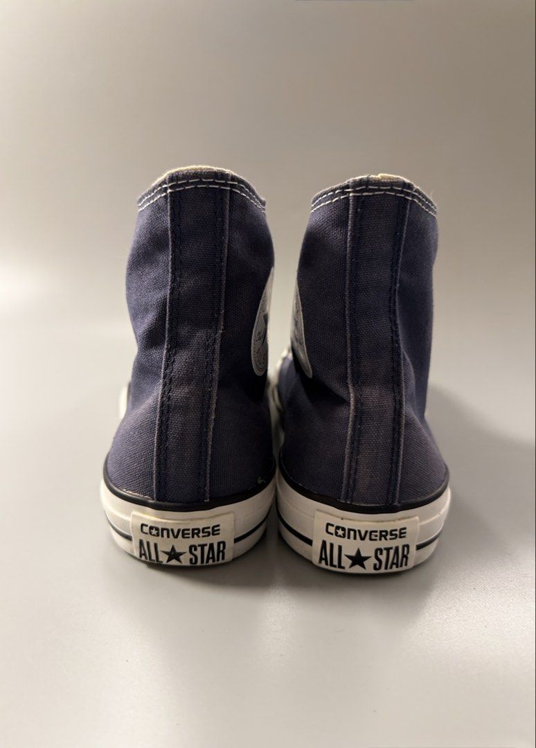 Converse Chuck Taylor All Star High Top Navy Blue (Category: Sneakers) located in Caloocan City. Submitted by maempenafi21452 (Listing ID 1470461084, Image 3). Description: - Brand: Converse High Tops - Color: Navy Blue with white laces and midsoles - Size: Men's 7.5 / Women's 9.5 / EUR 41 - Condition: Excellent, barely any wear on outsoles - Details: Classic canvas upper, rubber toe cap, and iconic All Star ankle patch - Style: Versatile everyda