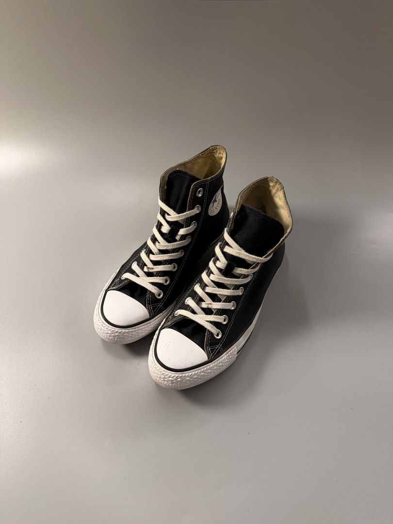 Converse Chuck Taylor All Star High Top Black (Category: Sneakers) located in Caloocan City. Submitted by maempenafi21452 (Listing ID 1470461089, Image 2). Description: - Item: Classic Black Converse High Tops - Size: US Men's 8 / US Women's 10 / EUR 41.5 - Condition: Clean, soles show minimal wear - Details: Canvas upper, white rubber toe caps, contrast stitching, and iconic All Star ankle patch - Inclusions: White laces and brown rubber outsole