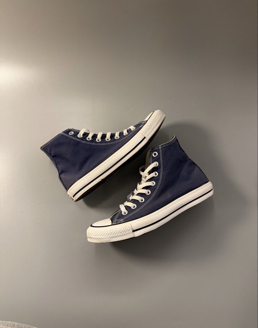 Converse Chuck Taylor All Star High Top Navy Blue (Category: Sneakers) located in Caloocan City. Submitted by maempenafi21452 (Listing ID 1470461084, Image 1). Description: - Brand: Converse High Tops - Color: Navy Blue with white laces and midsoles - Size: Men's 7.5 / Women's 9.5 / EUR 41 - Condition: Excellent, barely any wear on outsoles - Details: Classic canvas upper, rubber toe cap, and iconic All Star ankle patch - Style: Versatile everyda