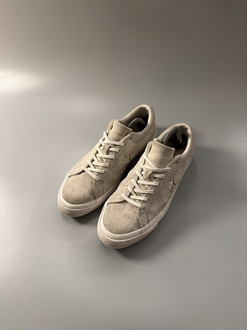 Converse One Star Suede Low Top Sneakers (Category: Sneakers) located in Quezon City. Submitted by markieexp (Listing ID 1470460516, Image 2). Description: - Brand: Converse - Model: One Star Suede - Color: Off-white with classic black piping and brown rubber outsole - Size: US 10 / EU 44 - Condition: Normal signs of wear on suede and midsoles, clean interior, excellent tread remaining - Features: Low-top design, signature star cutout, white lace