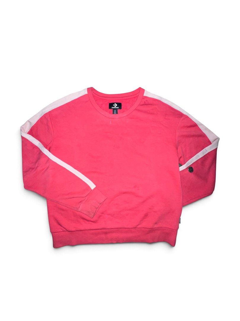 Converse Pink Sweatshirt with White Stripes (Category: Coats, Jackets and Outerwear) located in Binan City. Submitted by huntwear_.turtle (Listing ID 1470352566, Image 1). Description: - Brand: Converse - Color: Bright pink with white sleeve stripes - Style: Crewneck sweatshirt, casual sporty look - Features: Long sleeves, ribbed cuffs and hem, classic neckline tag - Condition: Comfortable and great for everyday wear.