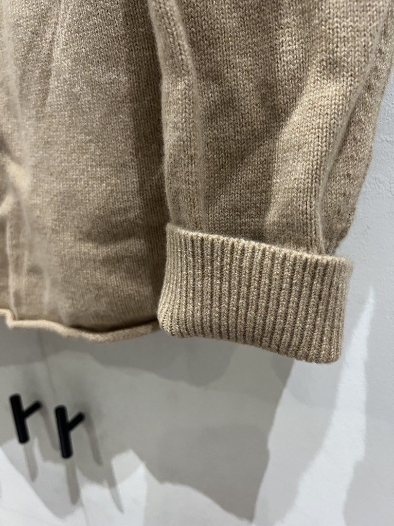COS Collared V-Neck Knit Sweater Camel Size M (Category: Coats, Jackets and Outerwear) located in Quezon City. Submitted by Zandee (Listing ID 1470487356, Image 3). Description: - Brand/Model: COS knit sweater - Color: Camel brown - Size: EUR M - Design: V-neckline with a pointed collar - Fit: Relaxed fit with long sleeves and ribbed cuffs - Material: Soft knit, ideal for layering during cooler weather - Condition: Excellent.