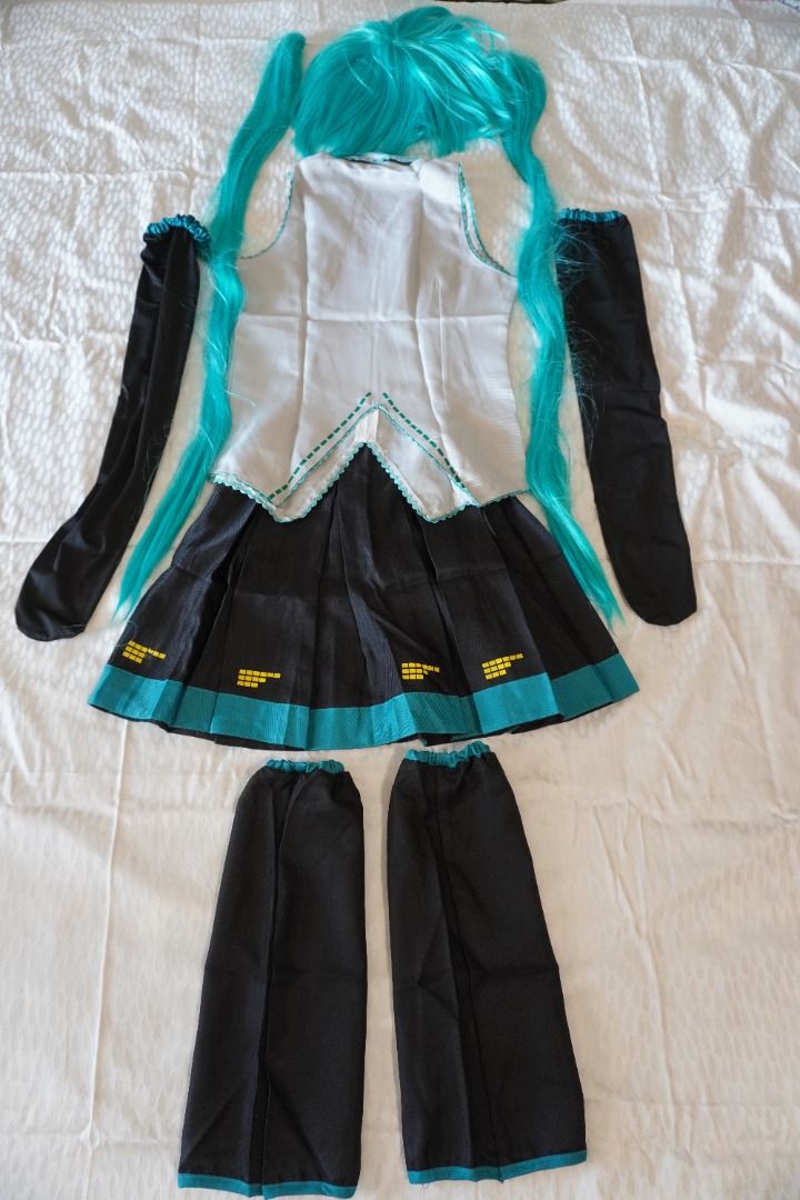 COSTUME - Hatsune Miku Anime Cosplay Set (Vocaloid Inspired) (Category: Babies & Kids Fashion) located in Muntinlupa City. Submitted by saveearth.buy2ndhand (Listing ID 1470546607, Image 2). Description: - Hatsune Miku Anime Cosplay Set (Vocaloid Inspired) - Includes Top, Skirt, Sleeves, Socks, and Twin-Tail Wig Original price: Php 2800 Selling price: Php 400 For: Girl Age: 8-12 years old Condition: 9/10 Flaws: None. ONLY AVAILABLE HERE ON CAROUS
