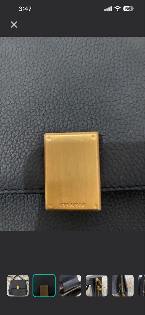Couronne Leather Shoulder Bag Navy Blue (Category: Shoulder Bags) located in Mabalacat. Submitted by queenscollectionph (Listing ID 1470504472, Image 2). Description: - Brand: Couronne - Color: Dark Navy Blue - Material: Premium grainy leather with gold-tone hardware - Closure: Structured flap with engraved branding - Versatility: Includes a top handle and a removable shoulder strap - Interior: Multi-compartment design with fabric lining and zip 
